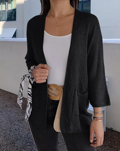 Kényelmes, nyitott elülső részű kötött kabát