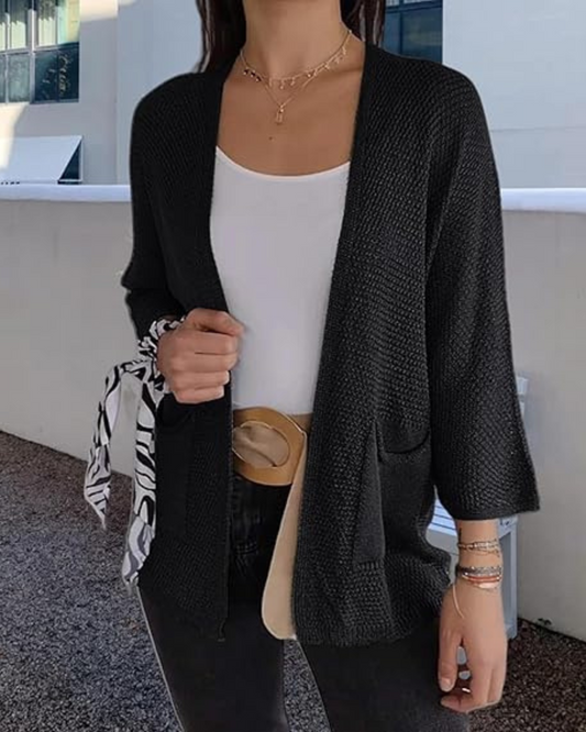 Kényelmes, nyitott elülső részű kötött kabát