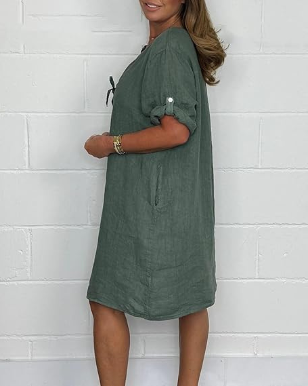 Hosszú ujjú elegáns gombokkal ellátott vászonruha