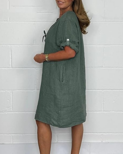 Hosszú ujjú elegáns gombokkal ellátott vászonruha